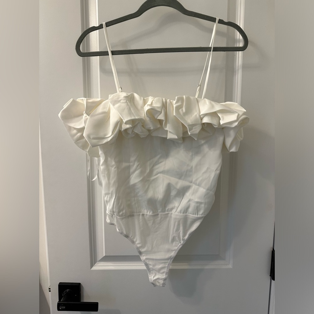 Lulus white body suit. Tags still on. Never worn, size small.